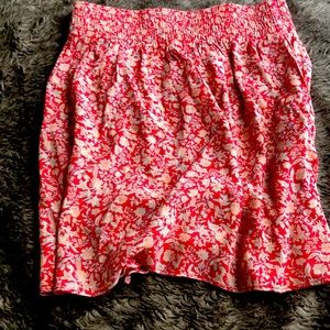 Super flow he floral red skirt with small flowers on it